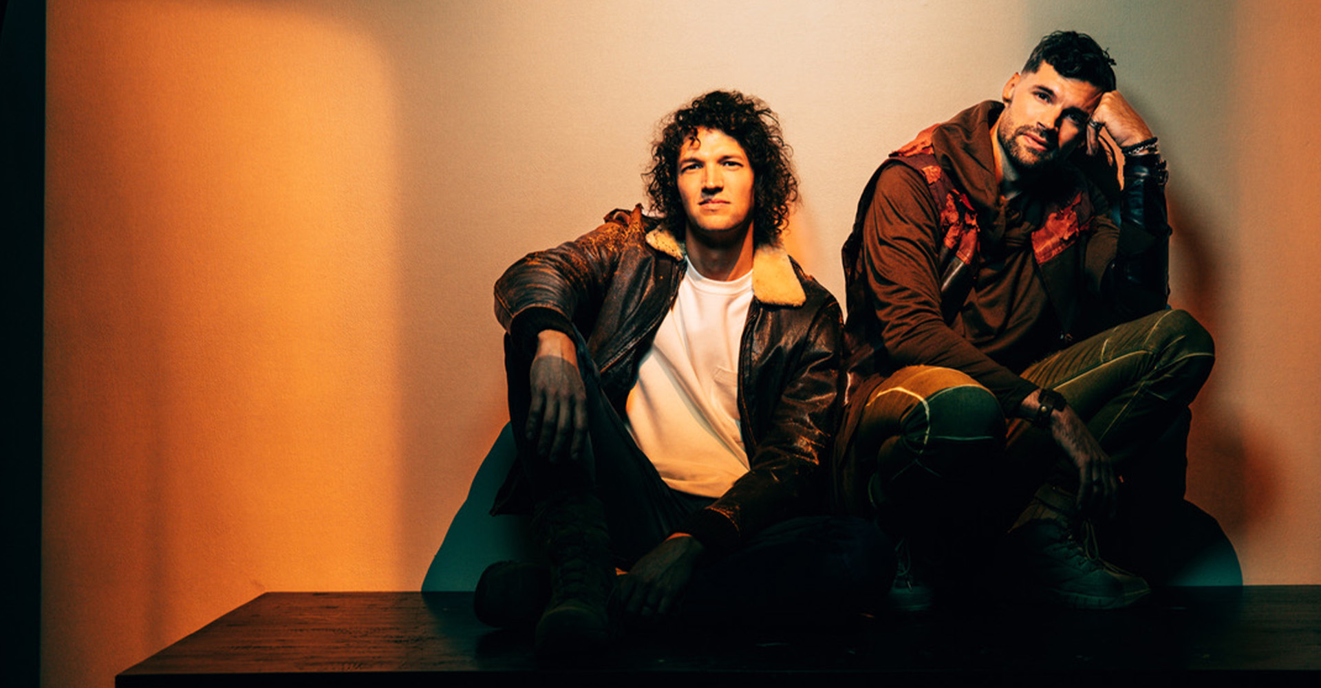 For King & Country in an orange room.