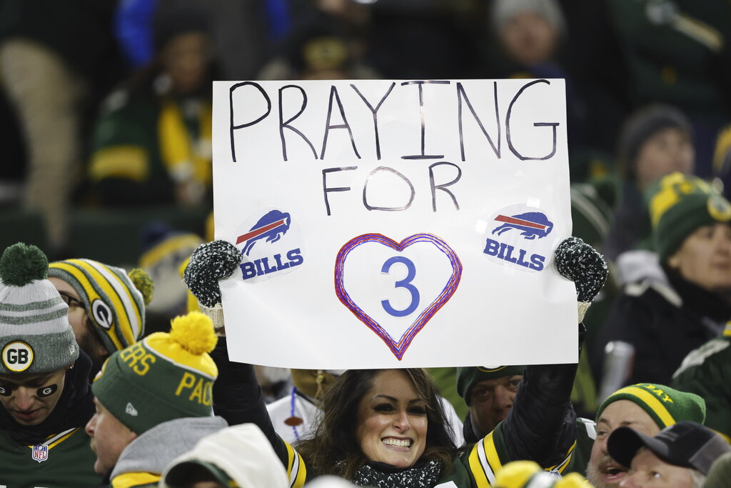 Buffalo Bills fans hold prayer vigils for Damar Hamlin with NFL star in  critical condition after cardiac arrest