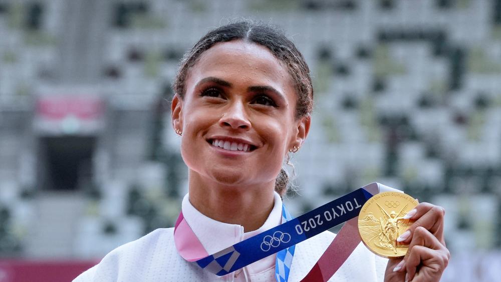 Olympian Sydney McLaughlin Marries NFL Player Andre Levrone Jr. - E! Online