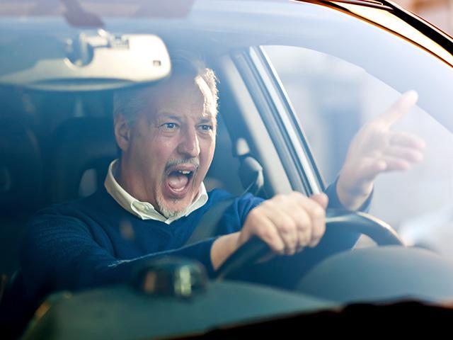 man in car angry with other driver
