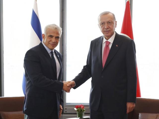 In this photo provided by the Turkish Presidency, Turkey&#039;s President Recep Tayyip Erdogan, right, shakes hands with Israeli Prime Minister Yair Lapid during their meeting on the sidelines of the United Nations General Assembly in NY, US, Sept. 20, 2022.
