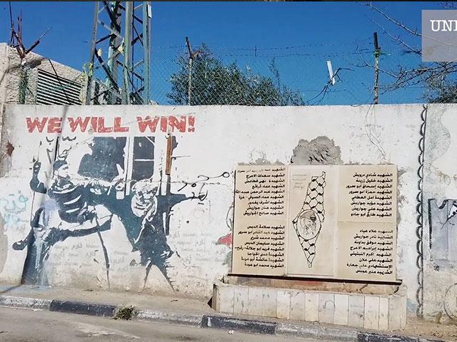 Bethlehem graffiti with Palestinian symbols on the map of Israel an example of what Palestinian children learn in UNRWA schools. Photo Credit: David Bedein, Center for Near East Policy Research.