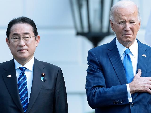 President Joe Biden, right, and Japanese Prime Minister Fumio Kishida stand the U.S. national anthem plays during a State Arrival Ceremony on the South Lawn of the White House, Wednesday, April 10, 2024, in Washington. (AP Photo/Susan Walsh)