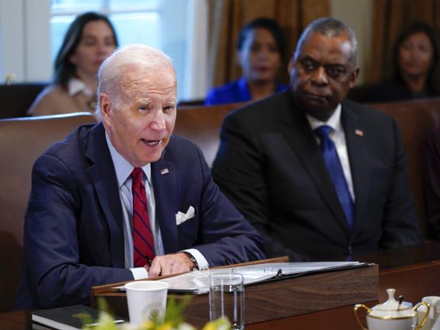 President Joe Biden speaks during a cabinet meeting at the White House, Thursday, Jan. 5, 2023, in Washington. Secretary of Defense Lloyd Austin listens at right. (AP Photo/Patrick Semansky)