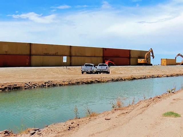 Shipping containers are being used in Arizona and Texas to plug gaps in the border fence.