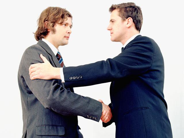 businessmen-shaking-hands_SI.jpg