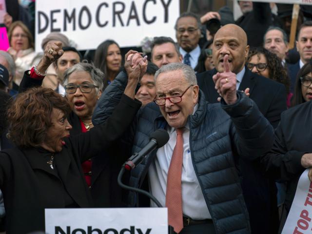 Senate Minority Leader Chuck Schumer, D-NY, and Rep. Maxine Waters, D-CA, lead a rally against Elon Musk outside the Treasury Department in Washington, Feb. 4, 2025. (AP Photo/Jose Luis Magana)