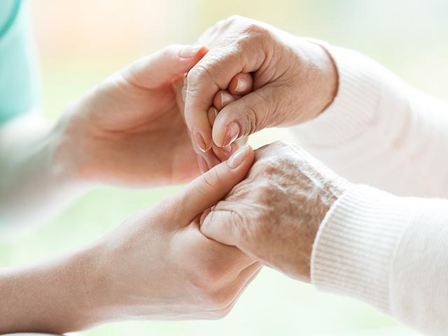 elderly-hands-holding_si.jpg
