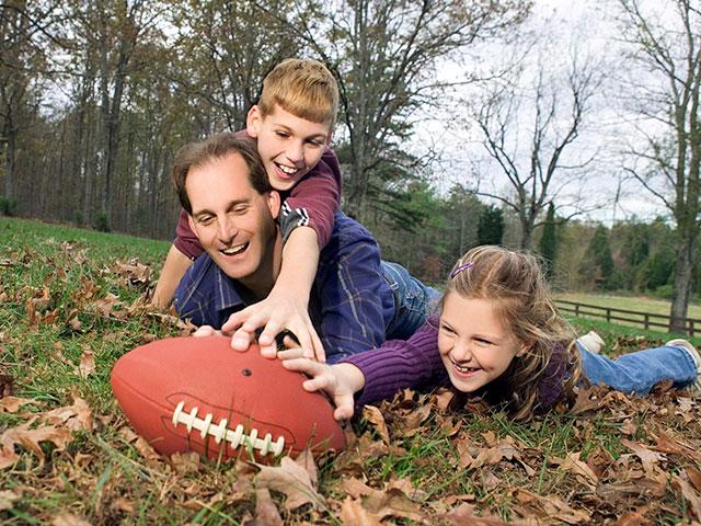Family traditions at Thanksgiving, playing football