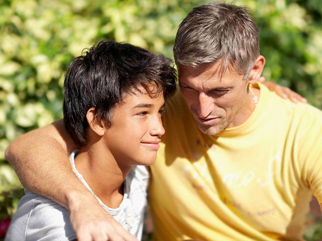 Father and son hugging