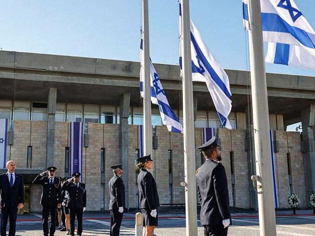 Israeli flags are lowered to half-mast at the Knesset for October 7th Remembrance Day. Photo Credit: Noam Moshkovich, Knesset Spokesperson.