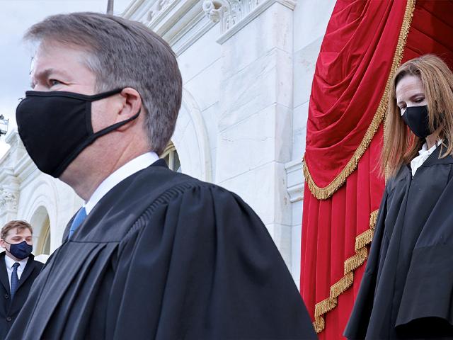 Supreme Court Justices Brett Kavanaugh and Amy Coney Barrett arrive for the 59th Presidential Inauguration, Jan. 20, 2021. (Jonathan Ernst/Pool Photo via AP)