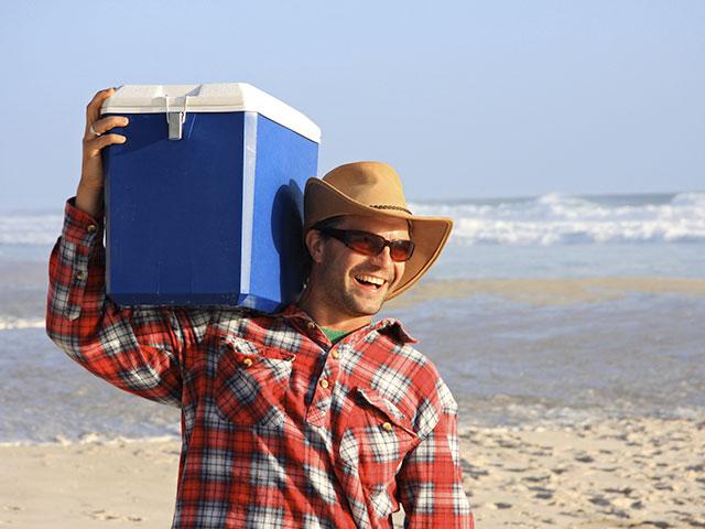 man-cooler-beach