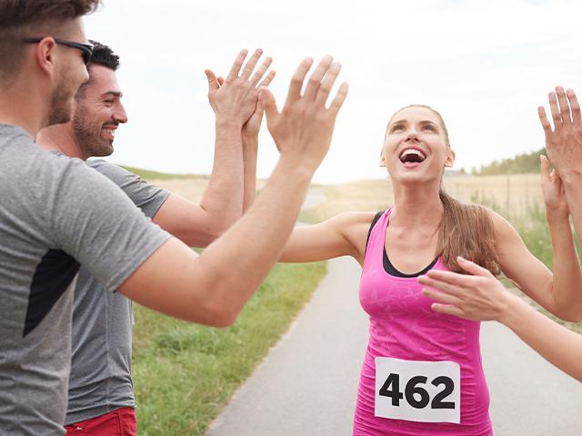 woman finishing marathon race