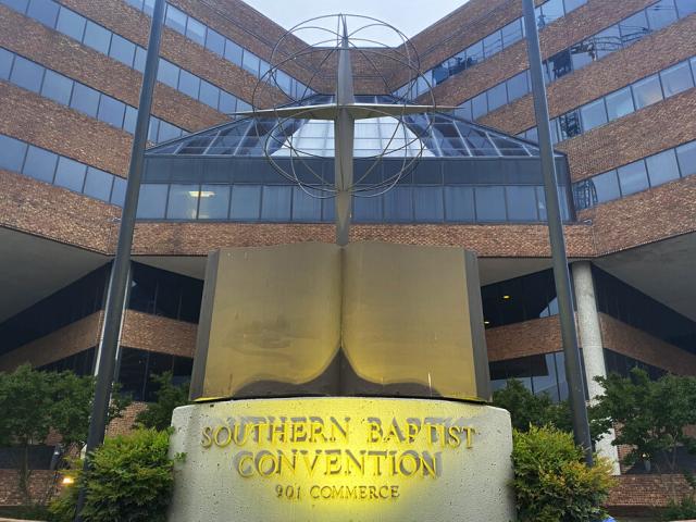 A cross and Bible sculpture stand outside the Southern Baptist Convention headquarters in Nashville, Tenn., on Tuesday, May 24, 2022.(AP Photo/Holly Meyer)