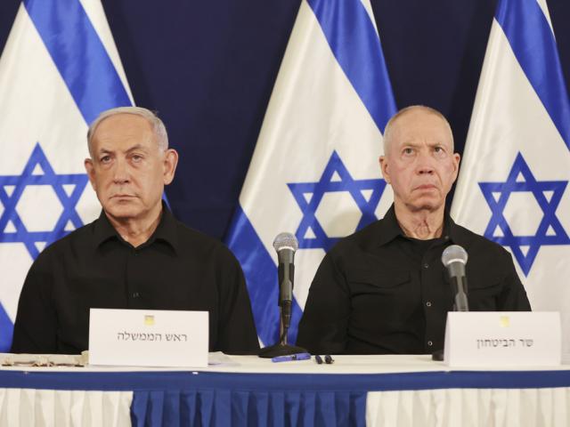 Israeli Prime Minister Benjamin Netanyahu and Defense Minister Yoav Gallant attend a press conference in the Kirya military base in Tel Aviv, Israel, Saturday, Oct. 28, 2023. (Abir Sultan/Pool Photo via AP)