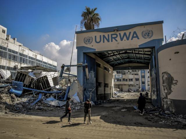 Palestinians examine the damage to UNRWA buildings in Gaza City, Feb. 10, 2024 (Photo: Omar Ishaq/Picture Alliance/dpa/AP images) FILE