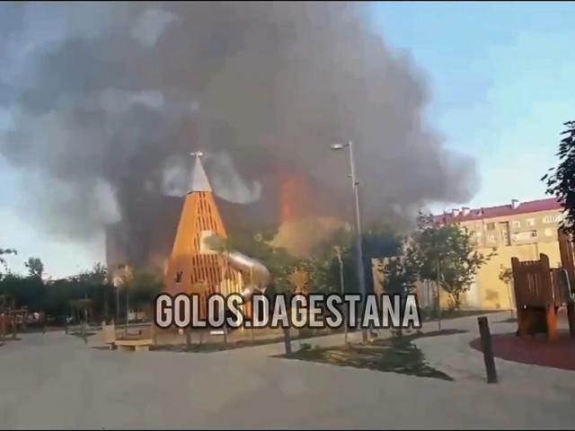 This photo taken from video released by Golos Dagestana shows smoke rises following an attack in Makhachkala, republic of Dagestan, Russia, Sunday, June 23, 2024. (Golos Dagestana via AP)