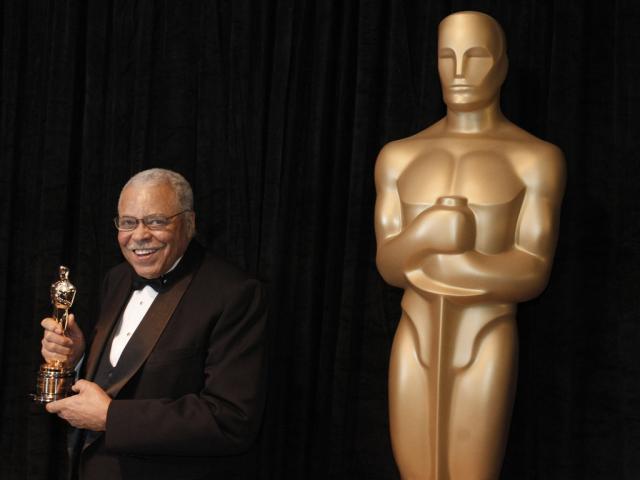 James Earl Jones poses with his honorary Oscar at the 84th Academy Awards on Sunday, Feb. 26, 2012, in the Hollywood section of Los Angeles. Jones died at age 93, Monday, Sept. 9, 2024. (AP Photo/Chris Carlson, File)