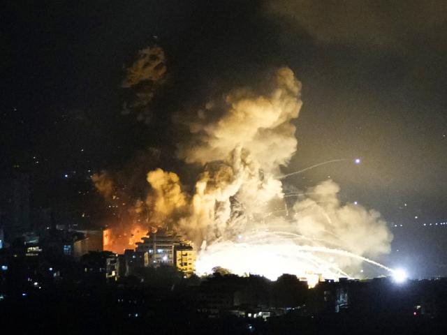 Smoke rises from Israeli airstrikes in Beirut&#039;s southern suburbs, Lebanon, Saturday, Sept. 28, 2024. (AP Photo/Hassan Ammar)