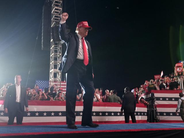 Republican presidential nominee former President Donald Trump gestures to the audience as he departs a campaign rally at the Calhoun Ranch, Saturday, Oct. 12, 2024, in Coachella, Calif. (AP Photo/Alex Brandon)