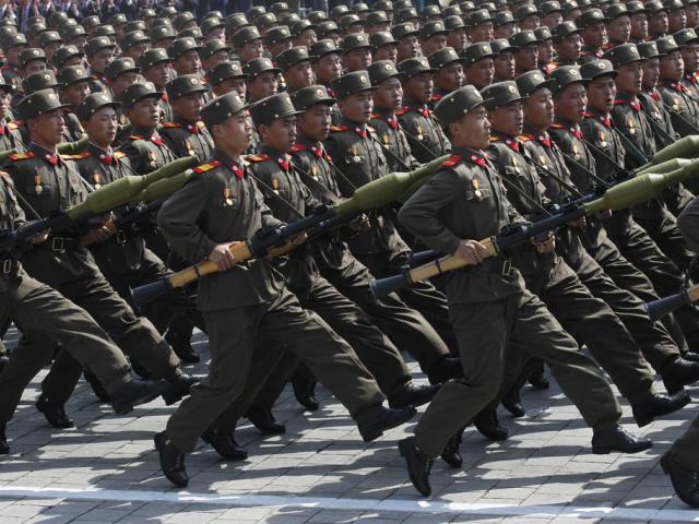 North Korean soldiers march during a mass military parade in Pyongyang&#039;s Kim Il Sung Square to celebrate 100 years since the birth of North Korean founder, Kim Il Sung on April 15, 2012. (AP Photo/Ng Han Guan, File)