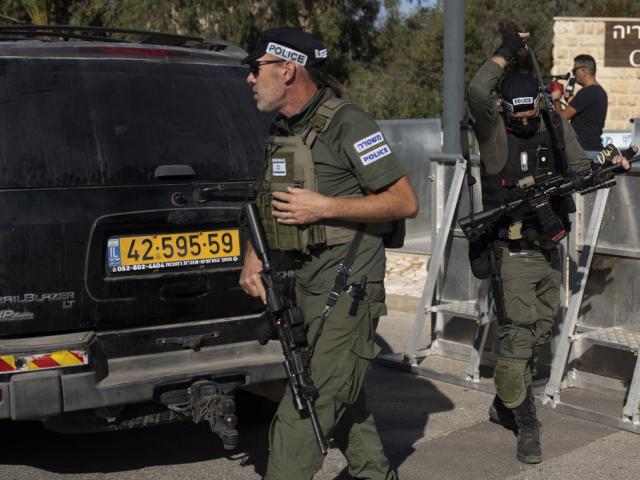 Israeli security forces secure a road near where Israel&#039;s government says a drone launched toward Israeli Prime Minister Benjamin Netanyahu&#039;s house in Caesarea, Israel Saturday, Oct. 19, 2024. (AP Photo/Ariel Schalit)