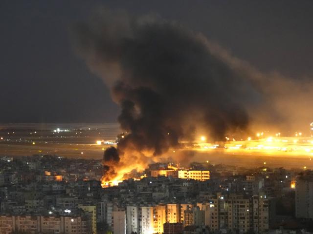 Flames and smoke rise form an Israeli airstrike on Dahiyeh, in the southern suburb of Beirut, Lebanon, Sunday, Oct. 20, 2024. (AP Photo/Hussein Malla)