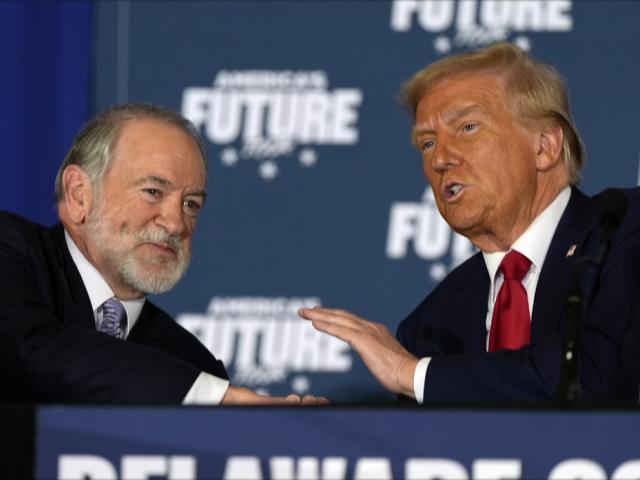 Republican presidential nominee former President Donald Trump talks with former Arkansas Gov. Mike Huckabee during a roundtable at the Drexelbrook Catering &amp; Event Center, Tuesday, Oct. 29, 2024, in Drexel Hill, Pa. (AP Photo/Julia Demaree Nikhinson)