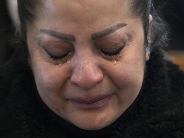 A Syrian Christians woman cries, as she attends the first Sunday Mass since Syrian President Bashar Assad&#039;s ouster, at Mariamiya Orthodox Church in old Damascus, Syria, Sunday, Dec. 15, 2024. (AP Photo/Hussein Malla)