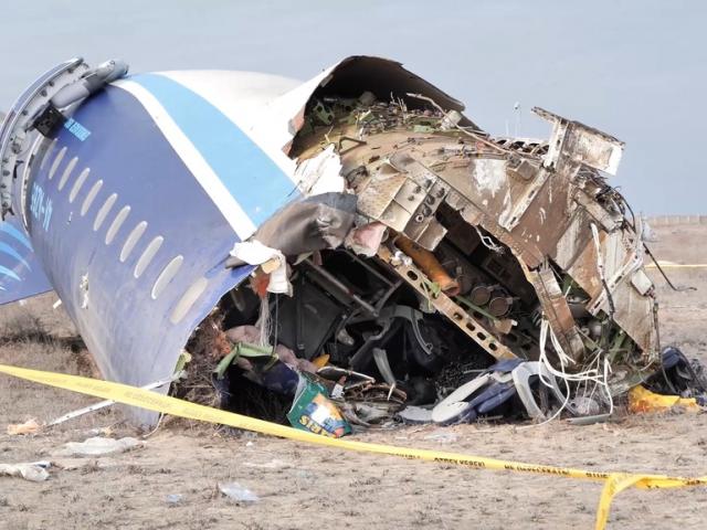 In this photo taken from a video, the wreckage of Azerbaijan Airlines Embraer 190 lies on the ground near the airport of Aktau, Kazakhstan, Wednesday, Dec. 25, 2024. (The Administration of Mangystau Region via AP)