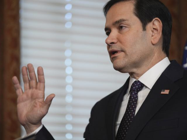 Secretary of State Marco Rubio is sworn by Vice President JD Vance in the Vice Presidential Ceremonial Office in the Eisenhower Executive Office Building on the White House campus, Tuesday, Jan. 21, 2025, in Washington. (AP Photo/Evan Vucci)