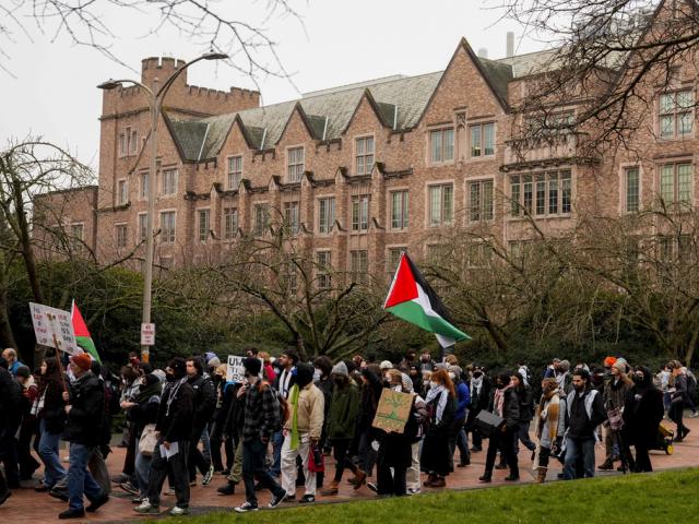 A pro-Palestinian protest marches at the University of Washington campus Wednesday, Feb. 5, 2025, in Seattle. (AP Photo/Lindsey Wasson)