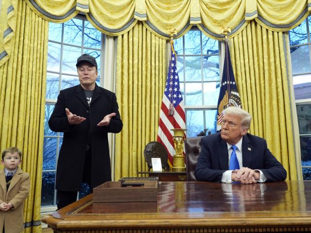 President Donald Trump listens as Elon Musk, joined by his son X Æ A-Xii, speaks in the Oval Office at the White House, Tuesday, Feb. 11, 2025, in Washington. (Photo/Alex Brandon)