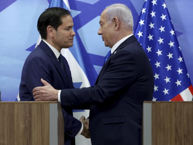 U.S. Secretary of State Marco Rubio, left, and Israeli Prime Minister Benjamin Netanyahu shake hands during a news conference at the Prime Minister&#039;s office in Jerusalem, Israel, Sunday, Feb. 16, 2025. (Evelyn Hockstein/Pool Photo via AP)