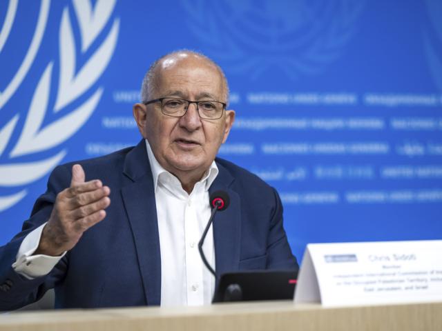 Chris Sidoti speaks about a report of the Independent Intl. Commission of Inquiry on the Occupied Palestinian Territory at the European headquarters of the United Nations, in Geneva, Switzerland, March 13, 2025. (Martial Trezzini/Keystone via AP)