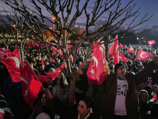 People gather outside the City Hall to protest the arrest of Istanbul Mayor Ekrem Imamoglu in Istanbul, Turkey, Wednesday, March 19, 2025. (AP Photo/Emrah Gurel)