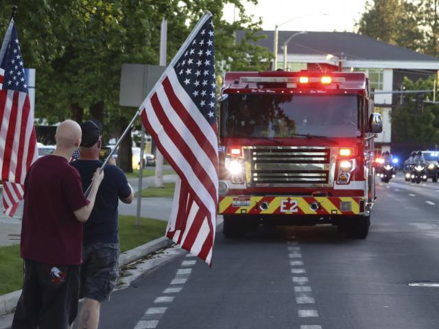 Two firefighters were killed Sunday, June 29, 2025, when they were ambushed by sniper fire while responding to a blaze in a northern Idaho mountain community, in Coeur d&#039;Alene. (Bill Buley/Coeur D&#039;Alene Press via AP)