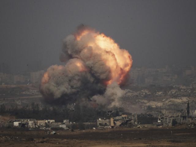 Smoke and fire rise to the sky following an Israeli army bombardment in the northern Gaza Strip, as seen from southern Israel, Thursday, July 10, 2025. (AP Photo/Leo Correa)