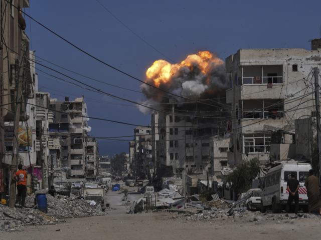 Smoke and flames erupt from an Israeli airstrike in Gaza City, Monday, July 21, 2025. (AP Photo/Jehad Alshrafi)