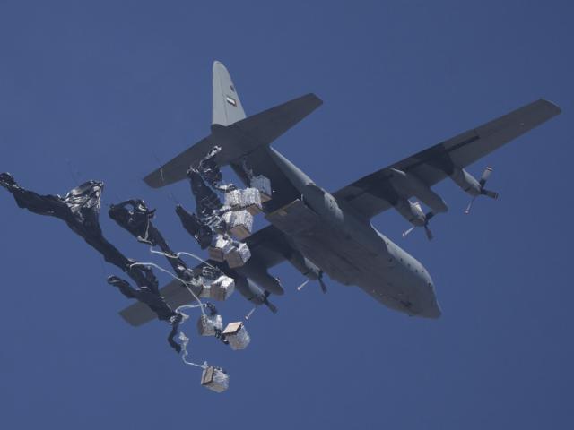 Humanitarian aid is airdropped to Palestinians over Gaza City, Gaza Strip, Sunday, July 27, 2025. (AP Photo/Jehad Alshrafi)