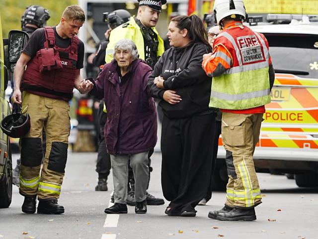 Police have shot a suspect after several people were stabbed and a car was driven at members of the public Heaton Park Hebrew Congregation synagogue in Crumpsall, Manchester, October 2, 2025. (Press Association via AP Images)