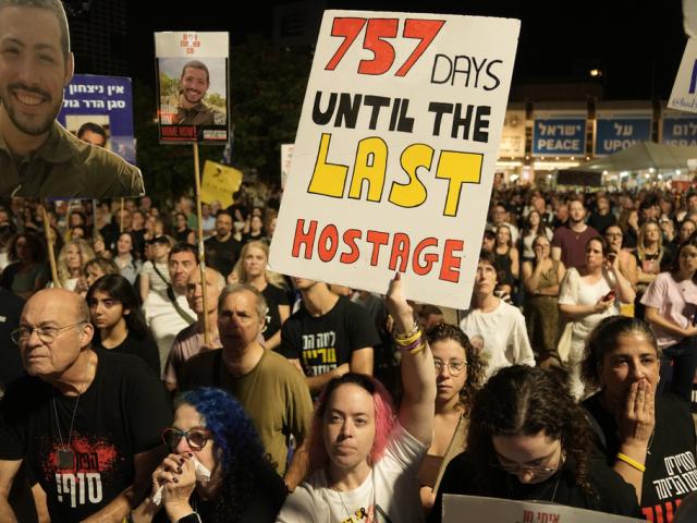 Relatives and supporters of hostages held by Hamas in the Gaza Strip attend a rally calling for their immediate release in Tel Aviv, Israel, Saturday, Nov. 1, 2025. (AP Photo/Mahmoud Illean)