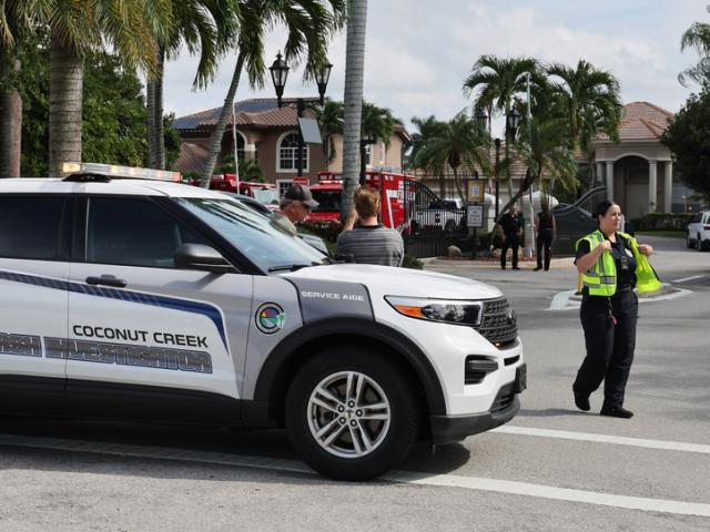 Emergency personnel from Coral Springs and Coconut Creek are on scene where a plane crashed in the Windsor Bay community in Coral Springs on Monday, Nov. 10, 2025. (Carline Jean/South Florida Sun-Sentinel via AP) Emergency personnel from Corala Springs and Coconut Creek, Florida, are on scene where a plane crashed in the Windsor Bay community in Coral Springs on Monday, Nov. 10, 2025. (Carline Jean/South Florida Sun-Sentinel via AP)