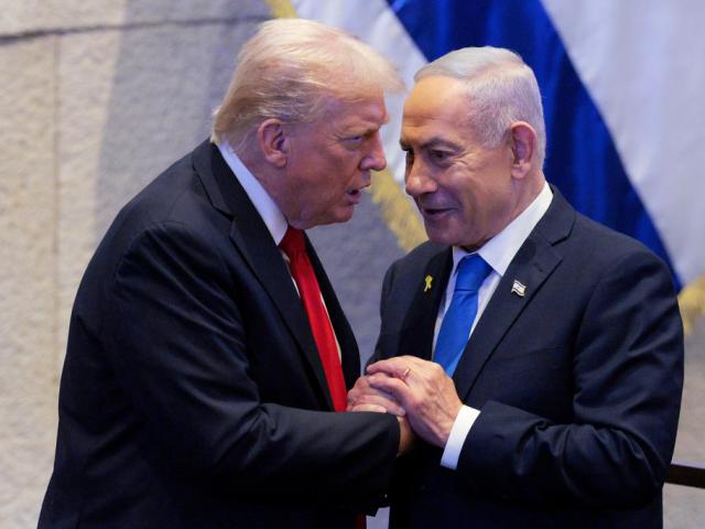 President Donald Trump talks with Israel&#039;s Prime Minister Benjamin Netanyahu at the Knesset, Israel&#039;s parliament, Monday, Oct. 13, 2025, in Jerusalem. (Chip Somodevilla/Pool via AP, file)