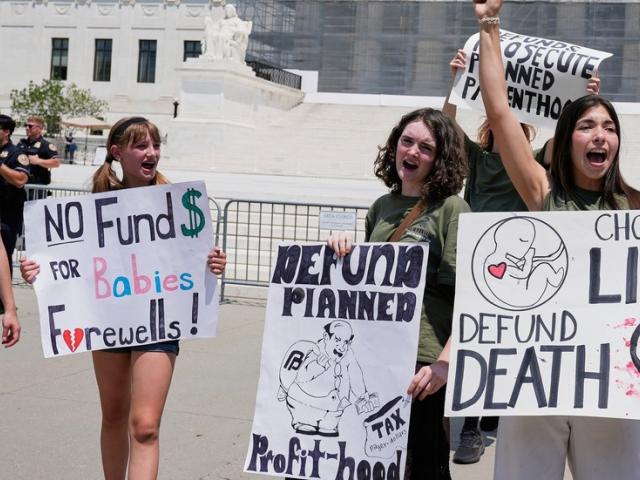 Pro-life protesters rally outside of the Supreme Court, Thursday, June 26, 2025, in Washington. (AP Photo/Mariam Zuhaib)