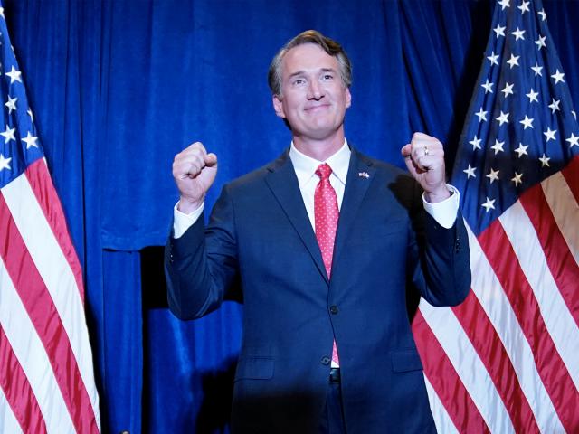 Virginia Gov.-elect Glenn Youngkin arrives to speak at an election night party in Chantilly, Va., early Wednesday, Nov. 3, 2021, after he defeated Democrat Terry McAuliffe. (AP Photo/Andrew Harnik)