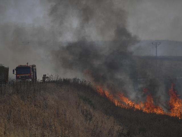 A fire broke out in northern Israel following an attack from Hezbollah in Lebanon, Thursday, July 4, 2024. (AP Photo/Gil Eliyahu)