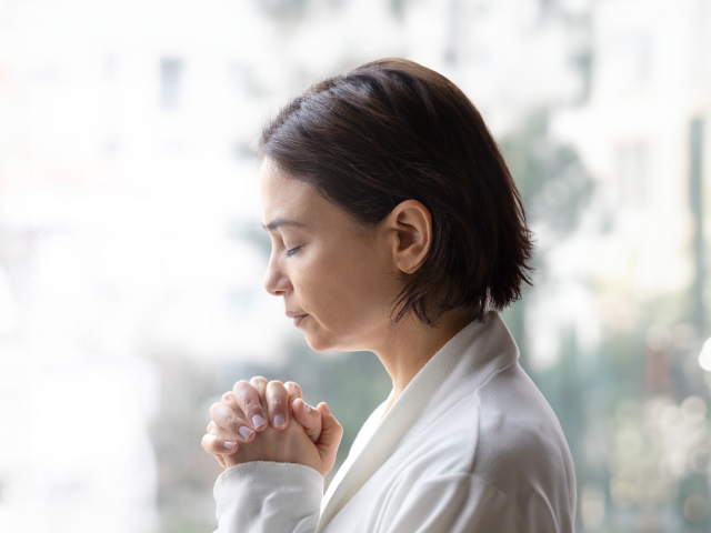 beautiful woman praying 
