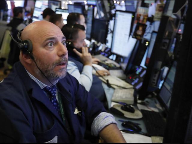 Trader Vincent Napolitano works on the floor of the New York Stock Exchange, Monday, Dec. 3, 2018. AP photo.